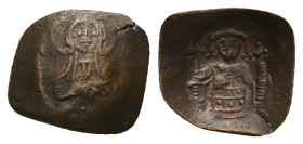 Latin Rulers of Constantinople, AD 1204-1261. AE, Trachy. 1.15 g. 18.53 mm. Constantinople.
Obv: Facing bust of Christ, holding Gospels and raising ri...