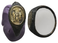Greco-Roman bronze finger-ring (AD 2nd–3rd centuries)
Bronze finger-ring; oval bezel within which is separately inserted a bronze-gilt plate; engrave...