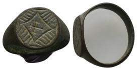 AE Early Byzantine signet-ring (AD 6th-8th centuries)
Bronze signet-ring; slightly raised circular bezel engraved with linear design and a cross in t...