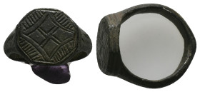 AE Early Byzantine signet-ring (AD 6th-8th centuries)
Bronze signet-ring; raised octagonal bezel engraved with linear design.
Weight: 8.72 g.
Diame...