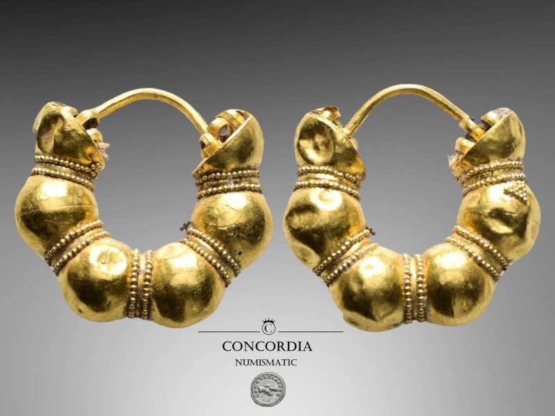 Gold hoop earring, one of a pair. Classical period (c. 5th century BC).
Gold ea...