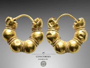 Gold hoop earring, one of a pair. Classical period (c. 5th century BC).
Gold earring, formed from five hollow spheres with hemispheres at the ends, t...