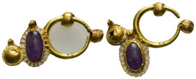 Roman gold ear ornament (AD 2nd–3th centuries)
Ear ornament made of gold and amethyst.
Weight: 4.44 g.
Diameter: 20.84 mm.