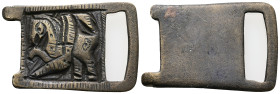 Byzantine Bronze, Belt-buckle (AD 7th-8th centuries). 
Belt buckle with rectangular body and integral fastening loop, embossed figure of a stylised wi...