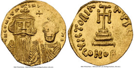 Constans II Pogonatus with Constantine IV (AD 654-668). AV solidus (19mm, 4.32 gm, 7h). NGC Choice AU 3/5 - 4/5, clipped. Constantinople, uncertain of...