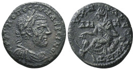 CILICIA, Tarsus. Macrinus.. 217-218 AD. AR Tetradrachm. Laureate head right / Tyche of Tarsus seated left on rock, holding grain ear and poppies; rive...