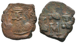 Byzantine Coins. Ae. Circa, 7th - 11th Century.
Reference:
Condition: Very Fine
W :4.8gr
H :21.4mm