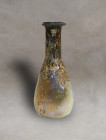Eastern Mediterranean Roman production this flask is made of pale glass and is comprised of a small piriform body with a cylindrical neck terminating ...