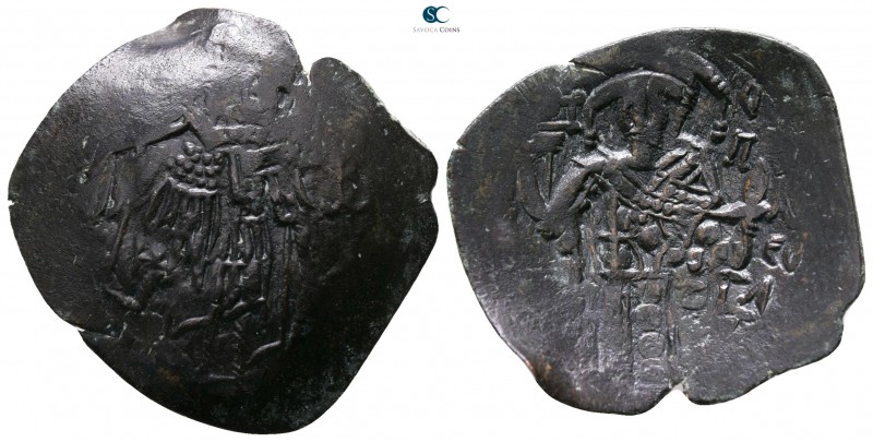 Michael VIII Palaeologus AD 1261-1282. Constantinople
Trachy Æ

22mm., 1,99g....