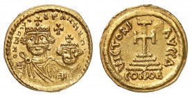 Héraclius 610-641.
Solidus 613-629, Ravenne. Bustes de face de Héraclius, plus grand et avec une courte barbe, et de Héraclius Constantin, plus petit...