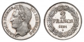 Royaume de Belgique
Léopold I, 1831-1865. 
2 Francs 1834. FRAPPE sur FLAN BRUNI. Tête couronnée de chêne à gauche / Valeur et date dans une couronne...