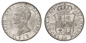 Royaume d'Espagne
Joseph Napoléon, 1808-1814. 
20 Reales 1810 M-AI, Madrid. Buste nu à gauche. Date au-dessous / Armoiries couronnées. Valeur de par...