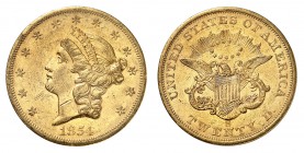 20 Dollars 1854 S, San Francisco. Tête de la Liberté à gauche, entourée de treize étoiles. Date en dessous / Ecusson sur une aigle aux ailes éployées....