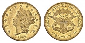 20 Dollars 1857 O, New Orleans. Tête de la Liberté à gauche, entourée de treize étoiles. Date en dessous / Ecusson sur une aigle aux ailes éployées. A...