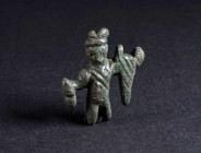A ROMAN MINIATURE BRONZE STATUETTE OF MERCURY Circa 2nd-3rd century AD. Despite the small size, Mercury can be clearly identified by his winged cap, t...