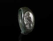 A ROMAN BRONZE RING DEPICTING THE GODDESS CERES Circa 2nd-3rd century AD. Ring with oval bezel showing Ceres with torch in her right hand and ears of ...
