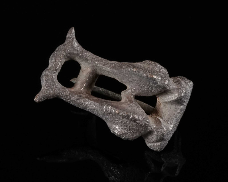 A ROMAN BRONZE DOUBLE DOLPHIN BROOCH Circa 2nd-3rd century AD. The bow in the sh...