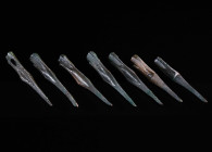 A GROUP OF SEVEN SCYTHIAN OR GREEK BRONZE ARROWHEADS Circa 6th-3rd century BC. Triangular cross-section; with socket and a very long point. Commonly r...