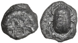 Greek Italy. Coastal Etruria, Vulci. Head of Metus/Scarab Group. AR Diobol, 5th-4th century BC. Obv. Head of Metus facing, open mouth with fangs. Rev....