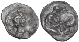Greek Italy. Southern Apulia, Tarentum. AR Diobol, c. 325-280 BC. Obv. Head of Athena right, wearing helmet decorated with Scylla. Rev. Herakles kneel...