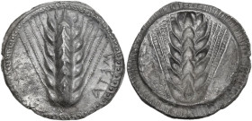 Greek Italy. Southern Lucania, Metapontum. AR Nomos, c. 540-510 BC. Obv. ΜΕΤΑ (retrograde) to right. Ear of barley with seven grains. Rev. Incuse ear ...