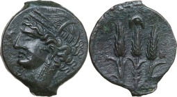 Punic Sardinia. AE Shekel (?), c. 241-215 BC. Uncertain mint. Obv. Wreathed head of Kore left, wearing triple-pendant earring; below chin, caduceus. R...