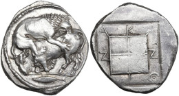 Continental Greece. Macedon, Akanthos. AR Tetradrachm, c. 470-430 BC. Attic standard. Obv. Lion right, attacking bull crouching left with head half-fa...