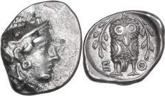 Continental Greece. Attica, Athens. AR Triobol, c. 350-294 BC. Obv. Helmeted head of Athena right, with profile eye. Rev. A-Θ-E. Owl standing facing, ...