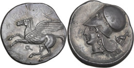 Continental Greece. Corinthia, Corinth. AR Stater, c. 400-375 BC. Obv. Pegasos flying left; below, koppa. Rev. Helmeted head of Athena left; to right,...