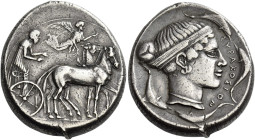 Syracuse
Tetradrachm circa 430-420, AR 26 mm, 17.58 g. Slow quadriga driven r. by charioteer holding reins and kentron. Nike, above, flying r. to cro...