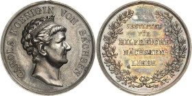 Orden deutscher Länder Sachsen
Silberne Carola-Medaille Verliehen 1915-1925. Silber. 28 mm, 12,13 g. Ohne Band Öse und Ring mit 2 Bänder für Krankenp...