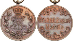 Orden deutscher Länder Sachsen
Friedrich-August-Medaille in Bronze Verliehen 1905-1918. Bronze, Durchmesser 28,5 mm, 11,11 g. Am Kämpferband mit Verl...
