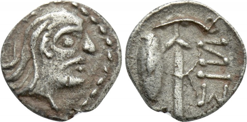 UNCERTAIN. Obol (?) (Circa 4th-3rd centuries BC).

Obv: Head right.
Rev: ΣΙИO...