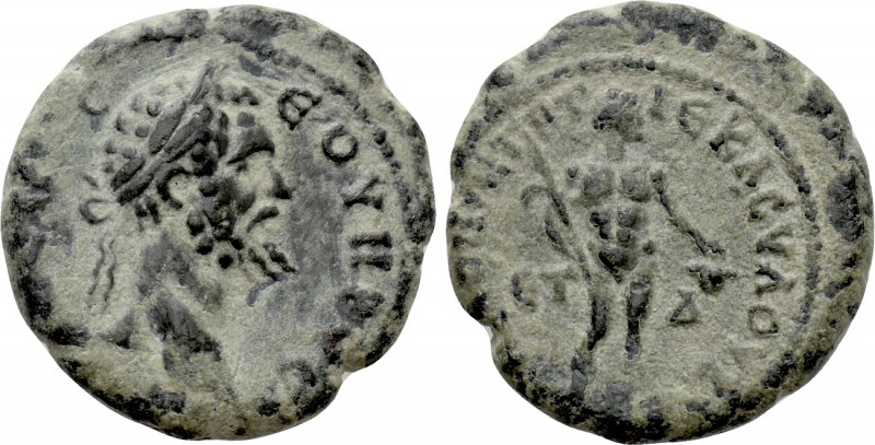 CAPPADOCIA. Tyana. Septimius Severus (193-211). Ae. Year 4 (195/6). 

Obv: AY ...