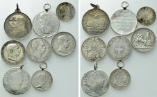 8 Silver Coins.