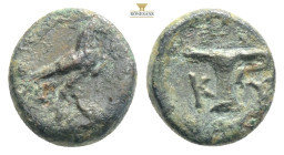 Aeolis, Kyme, AE, Circa 350-250 BC, magistrate.
Obv: [ΑΝ]ΤΙΚΡΑΤ[ΗΣ], Eagle standing right.
Rev: KY - One-handled cup left.
Ref: Cf. SNG Copenhagen 44-...