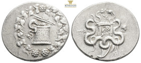 Tralles, Lydia AR Cistophoric Tetradrachm. Ca 140-135 BC. 30,2 mm, 12.30 gr. Cista mystica with serpent in ivy wreath / TΡAΛ, Bow-case between two ser...