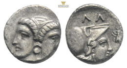 Mysia, Lampsakos (4th-3rd cent. BC) AR Diobol 
Obv: Janiform female head.
Rev: ΛΑΜΨ, Helmeted head of Athena right within incuse circle.
Ref: SNG BN 1...