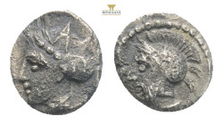 Cilicia, Tarsos. AR Obol. ca 379-372 BC.
Head of Ares or Datames/Pharnabazos, wearing Attic helmet.
Rev. Female head left, wearing tripartite crown an...