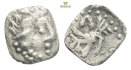 LYCAONIA. Laranda. Obol (4th century BC).
Obv: Baaltars seated left, holding grain ear, grapes and sceptre.
Rev: Forepart of wolf right; crescent abov...