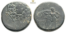PONTOS.Amisos.(Circa 105-63 BC).Ae.

Obv : Aegis with Gorgon's head at center.

Rev : AΜΙΣΟΥ.
Nike advancing right, holding wreath and palm branch, be...