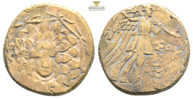 PONTOS.Amisos.(Circa 105-63 BC).Ae.

Obv : Aegis with Gorgon's head at center.

Rev : AΜΙΣΟΥ.
Nike advancing right, holding wreath and palm branch, be...