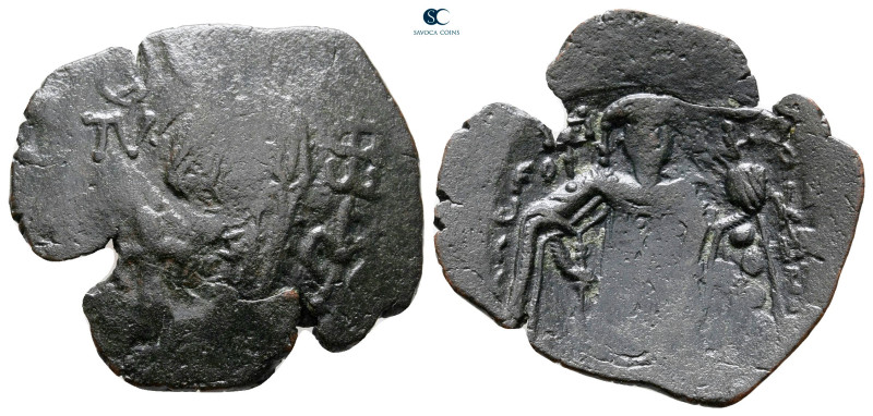 Michael VIII Palaeologus AD 1261-1282. Constantinople
Trachy Æ

24 mm, 2,15 g...
