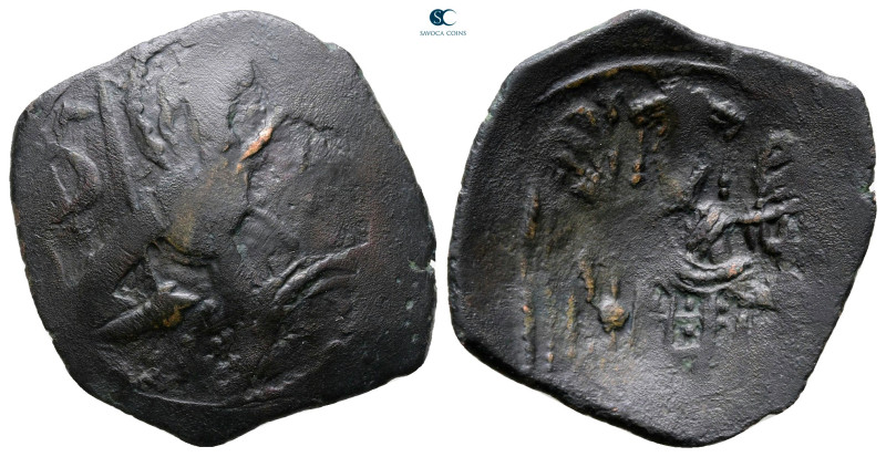 Michael VIII Palaeologus AD 1261-1282. Thessalonica
Trachy Æ

23 mm, 1,72 g
...