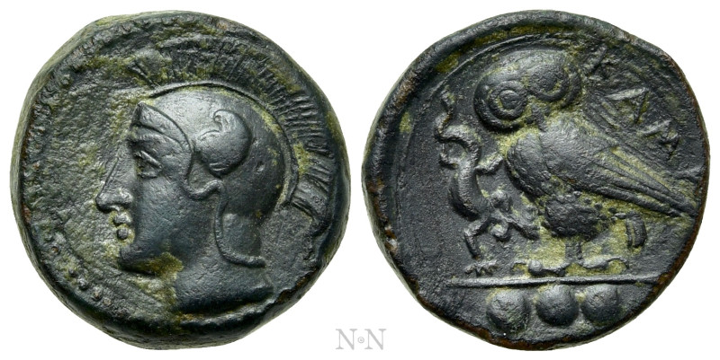 SICILY. Kamarina. Ae Tetras or Trionkion (Circa 420-405 BC).

Obv: Helmeted he...