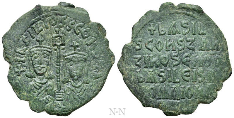 BASIL I THE MACEDONIAN with CONSTANTINE (867-886). Follis. Constantinople (or un...