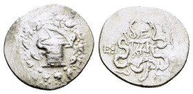 IONIA. Ephesos. Roman Rule (133-67 BC). Cistophor. 

Obv : Cista mystica with serpent; all within ivy wreath.

Rev : Bowcase between two serpents; EΦΕ...