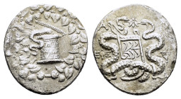 IONIA. Ephesos.(Circa 180-67 BC).Cistophor.

Obv : Cista mystica with serpent; all within ivy wreath.

Rev : Bowcase between two serpents; EΦΕ to left...