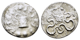 LYDIA. Tralleis.(140-135 BC).Cistophor.

Obv : Cista mystica with serpent; all within ivy wreath.

Rev : TPAΛ.
Bow case between wo serpents, head of H...