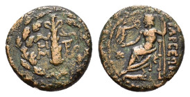 CILICIA. Tarsos (164-27 BC). Ae.

Obv : Filleted club; monogram to left and right; all within oak wreath.

Rev : TAPCЄΩN.
Zeus seated left on throne, ...